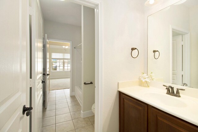 19903 Mulberry Pine Ln, Cypress, TX 77429 - bathroom featuring vanity, tile patterned flooring, toilet, shower / tub combination, and baseboards