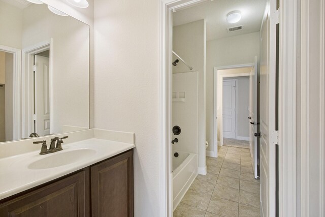 19903 Mulberry Pine Ln, Cypress, TX 77429 - full bath with vanity, shower / bathtub combination, tile patterned floors, and toilet