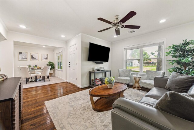 1709 Chantilly Ln, Houston, TX 77018 - living area with plenty of natural light, crown molding, wood finished floors, ceiling fan, and recessed lighting