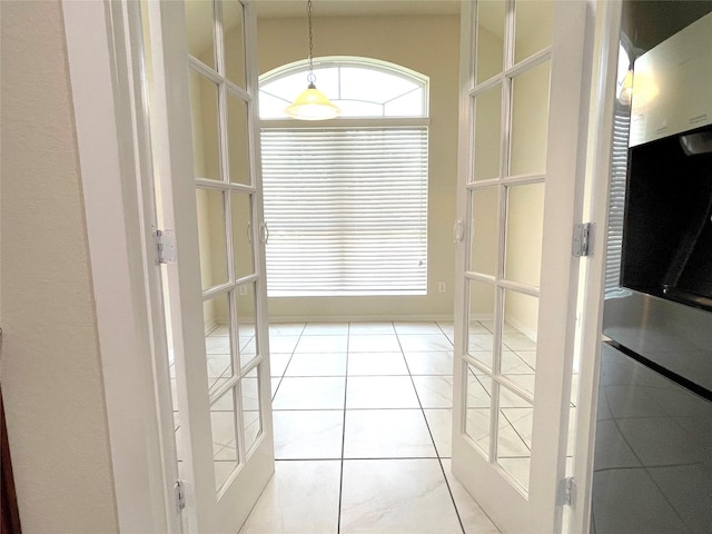 29314 Nectar Bloom Ct, Spring, TX 77386 - doorway with light tile patterned flooring