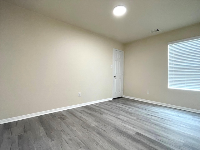29314 Nectar Bloom Ct, Spring, TX 77386 - empty room with dark wood-style floors and baseboards