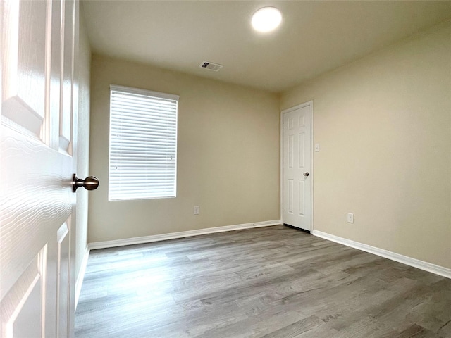 29314 Nectar Bloom Ct, Spring, TX 77386 - spare room with wood finished floors, baseboards, and plenty of natural light