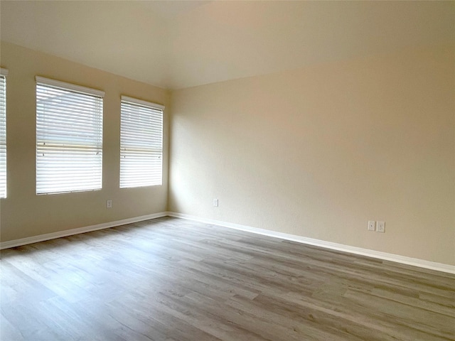 29314 Nectar Bloom Ct, Spring, TX 77386 - empty room featuring wood finished floors and baseboards