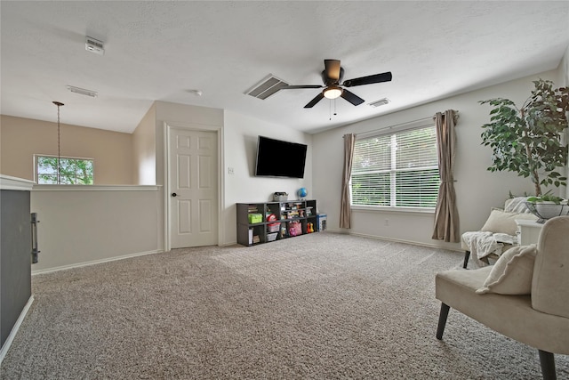 15314 Yellow Oak Trl, Cypress, TX 77433 - sitting room with ceiling fan, baseboards, and carpet flooring