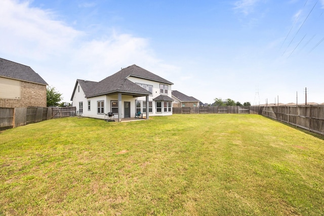 2302 Elmwood Trl, Katy, TX 77493 - back of property with a patio area, a shingled roof, and stucco siding
