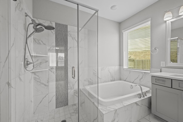 2302 Elmwood Trl, Katy, TX 77493 - bathroom with vanity, a bath, a marble finish shower, and marble look tile flooring