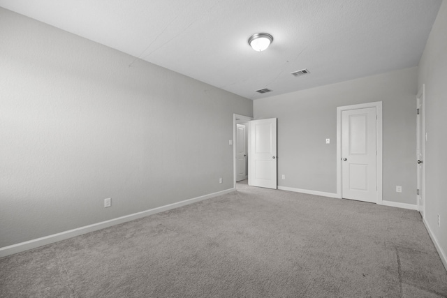 2302 Elmwood Trl, Katy, TX 77493 - unfurnished bedroom with carpet flooring and baseboards
