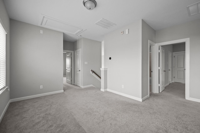 2302 Elmwood Trl, Katy, TX 77493 - empty room featuring attic access, carpet, and healthy amount of natural light