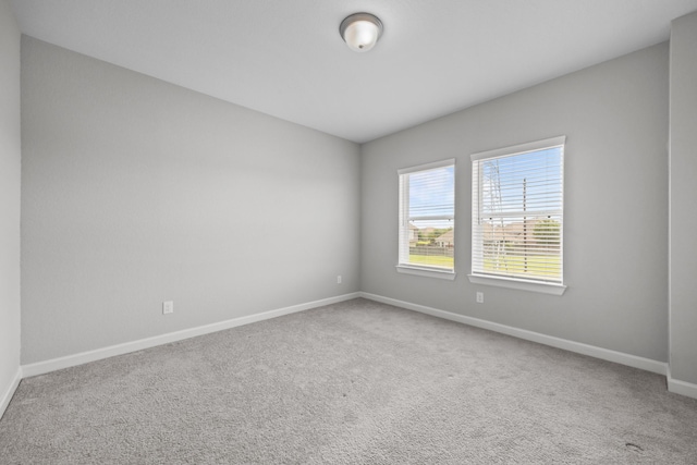 2302 Elmwood Trl, Katy, TX 77493 - unfurnished room with baseboards and carpet flooring
