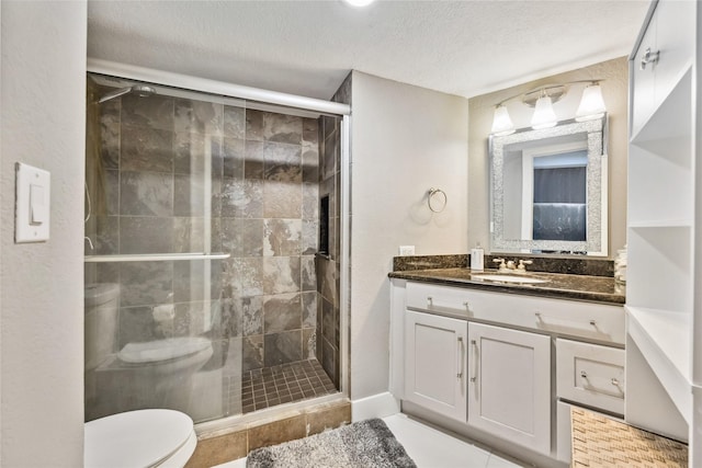 3525 Sage Rd Unit 1713, Houston, TX 77056 - full bathroom with toilet, a shower stall, vanity, and a textured ceiling