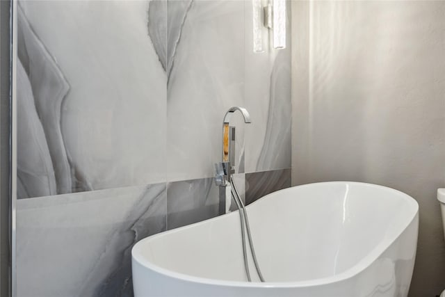 3525 Sage Rd Unit 1713, Houston, TX 77056 - bathroom with a freestanding bath