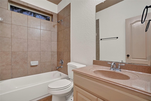 10 Tallgrass Way, Spring, TX 77389 - full bath featuring a textured wall, vanity, and bathing tub / shower combination