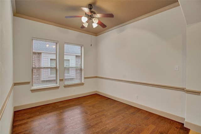 10 Tallgrass Way, Spring, TX 77389 - unfurnished room with a ceiling fan, crown molding, and wood finished floors