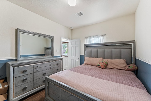 14706 Meadow Acre Trl, Houston, TX 77049 - bedroom featuring dark wood-type flooring