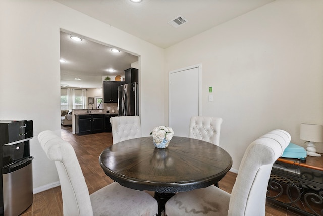 14706 Meadow Acre Trl, Houston, TX 77049 - dining space with dark wood-style floors, baseboards, and recessed lighting