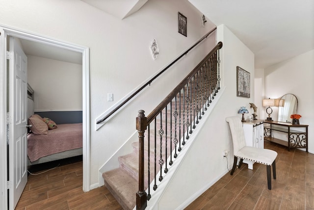 14706 Meadow Acre Trl, Houston, TX 77049 - staircase featuring wood finished floors and baseboards