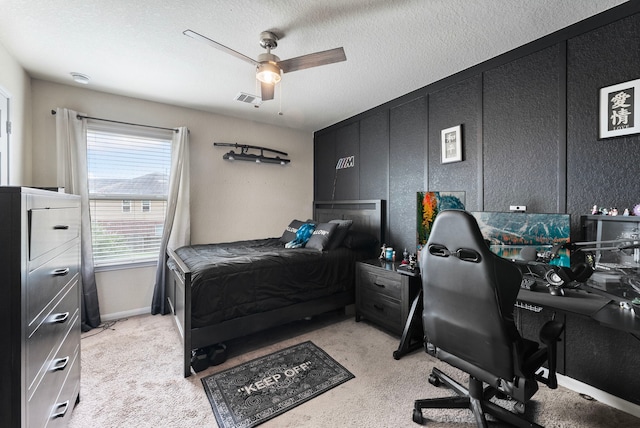 14706 Meadow Acre Trl, Houston, TX 77049 - bedroom with an office area, light colored carpet, and a ceiling fan