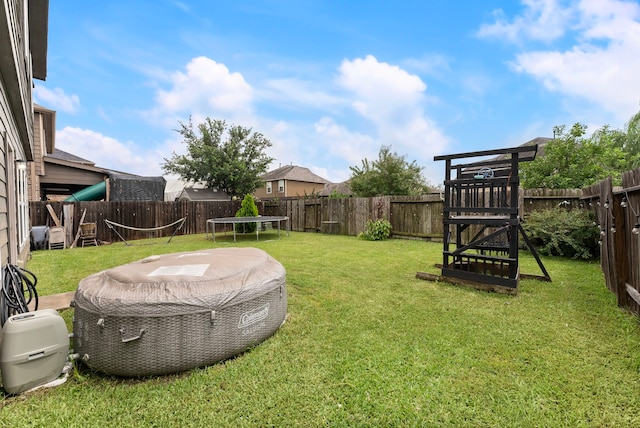 14706 Meadow Acre Trl, Houston, TX 77049 - view of yard featuring a trampoline