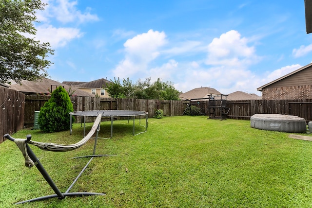 14706 Meadow Acre Trl, Houston, TX 77049 - view of yard featuring a trampoline