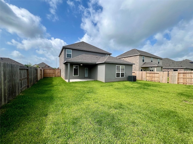 3031 Sunmoon Ln, Katy, TX 77493 - rear view of property featuring a patio, a fenced backyard, and roof with shingles