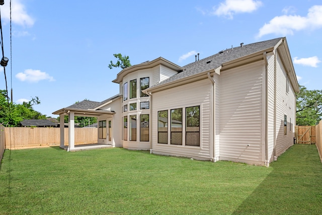 7913 Turquoise Ln, Houston, TX 77055 - rear view of house featuring a patio and roof with shingles