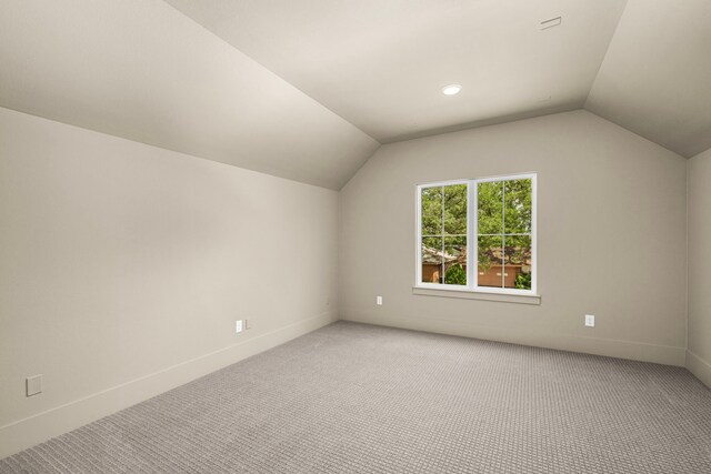 7913 Turquoise Ln, Houston, TX 77055 - bonus room featuring light colored carpet, vaulted ceiling, and baseboards