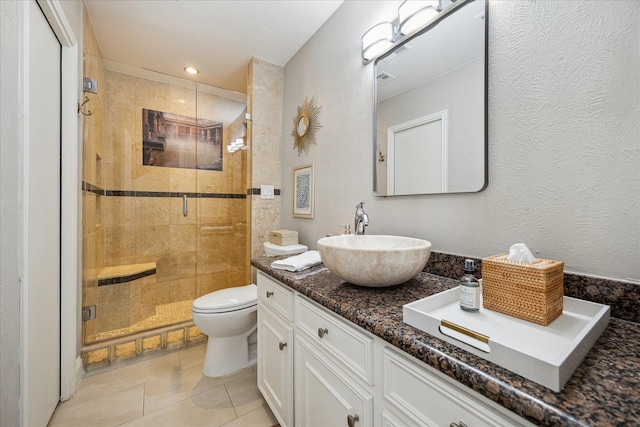 706 St Ives Ct, Houston, TX 77079 - full bath featuring a shower stall, toilet, vanity, and tile patterned flooring