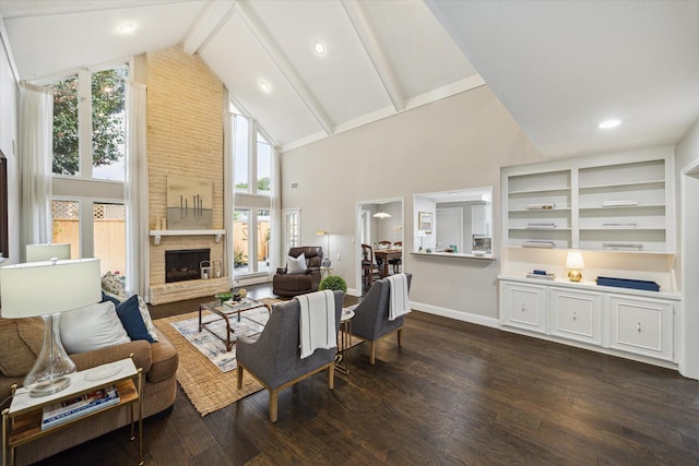 706 St Ives Ct, Houston, TX 77079 - living area with high vaulted ceiling, a large fireplace, dark wood-type flooring, beamed ceiling, and baseboards