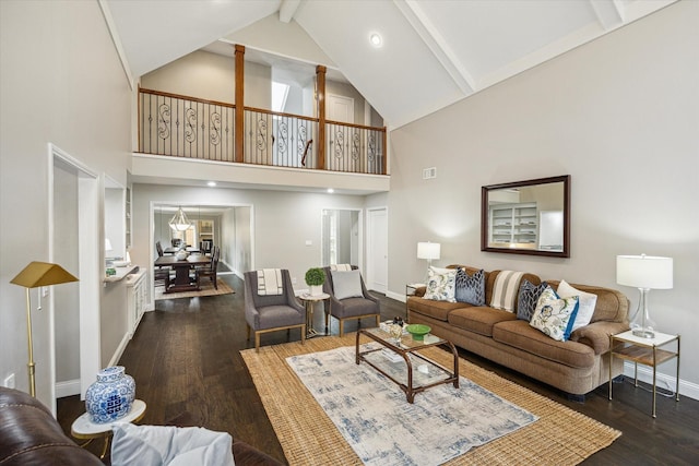 706 St Ives Ct, Houston, TX 77079 - living area with high vaulted ceiling, baseboards, beam ceiling, and wood finished floors