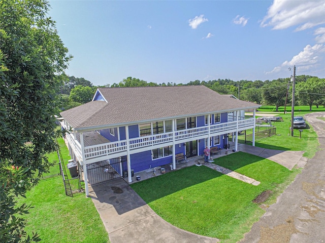 374 Harbor View Dr, Livingston, TX 77351 - view of front of house with concrete driveway, a gate, and roof with shingles