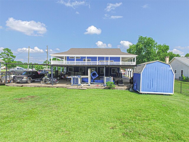 374 Harbor View Dr, Livingston, TX 77351 - back of house featuring a patio area, a shingled roof, and a deck
