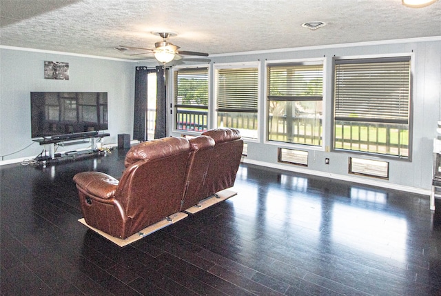 374 Harbor View Dr, Livingston, TX 77351 - living room featuring crown molding, baseboards, a textured ceiling, ceiling fan, and wood finished floors