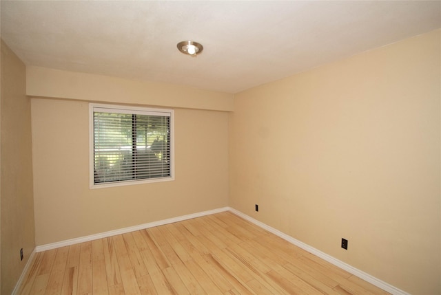 374 Harbor View Dr, Livingston, TX 77351 - unfurnished room with light wood-style floors and baseboards