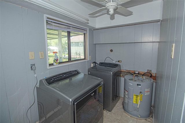 374 Harbor View Dr, Livingston, TX 77351 - laundry room featuring water heater, washer and dryer, a ceiling fan, and light tile patterned floors