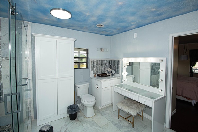 374 Harbor View Dr, Livingston, TX 77351 - ensuite bathroom featuring a stall shower and toilet