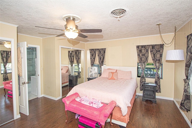 374 Harbor View Dr, Livingston, TX 77351 - bedroom with wood finished floors, a textured ceiling, ornamental molding, baseboards, and ceiling fan