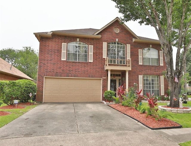 4915 Dove Springs Dr, Houston, TX 77066 - colonial inspired home with an attached garage, driveway, and brick siding