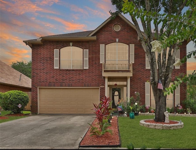 4915 Dove Springs Dr, Houston, TX 77066 - view of front of home with concrete driveway, a garage, brick siding, and a yard