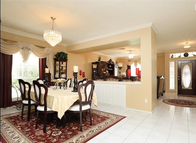 4915 Dove Springs Dr, Houston, TX 77066 - dining area featuring crown molding, light tile patterned floors, a chandelier, and baseboards