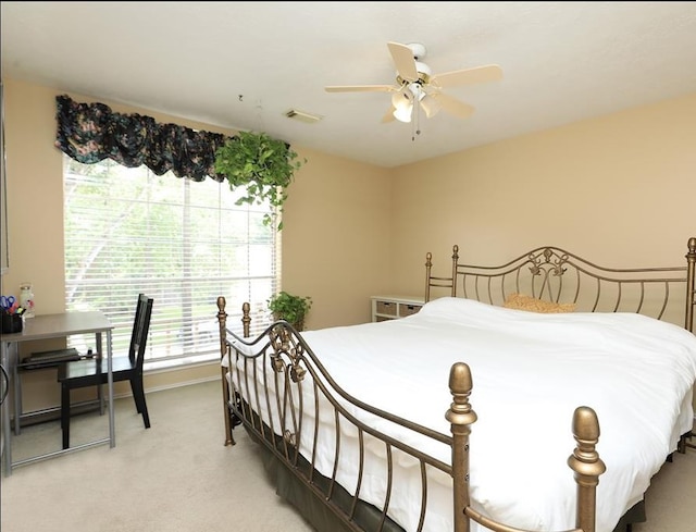 4915 Dove Springs Dr, Houston, TX 77066 - bedroom with light carpet, a ceiling fan, and baseboards