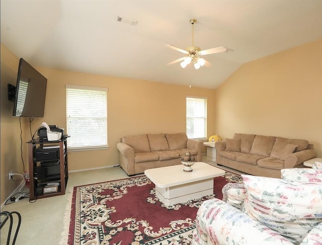 4915 Dove Springs Dr, Houston, TX 77066 - living room featuring light carpet, lofted ceiling, a ceiling fan, and baseboards