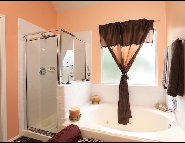 4915 Dove Springs Dr, Houston, TX 77066 - bathroom with healthy amount of natural light, a shower stall, and a jetted tub