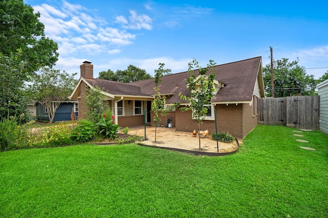 4922 Nina Lee Ln, Houston, TX 77092 - rear view of house featuring brick siding, a chimney, roof with shingles, and a patio