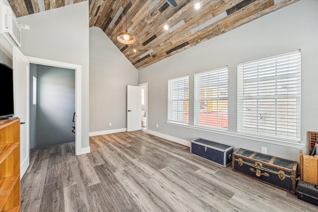 529 Fugate St, Houston, TX 77009 - living area featuring wood ceiling, wood finished floors, baseboards, a ceiling fan, and high vaulted ceiling