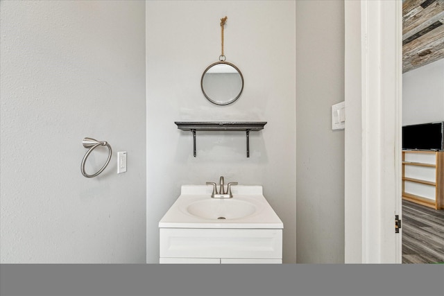 529 Fugate St, Houston, TX 77009 - bathroom featuring vanity and wood finished floors