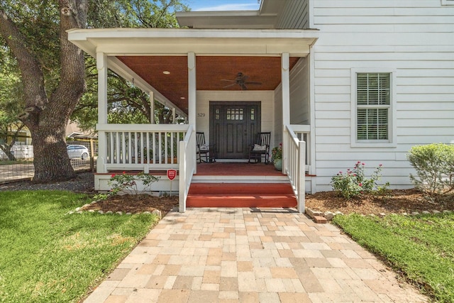 529 Fugate St, Houston, TX 77009 - view of exterior entry with a ceiling fan and covered porch