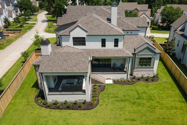 23 Dara Beth Ct, The Woodlands, TX 77381 - back of house with roof with shingles, stucco siding, and a chimney