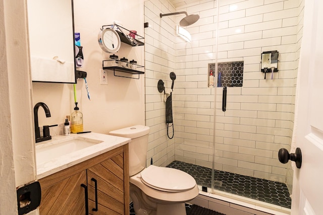 326 W 28th St, Houston, TX 77008 - bathroom featuring a stall shower, a baseboard heating unit, toilet, and vanity