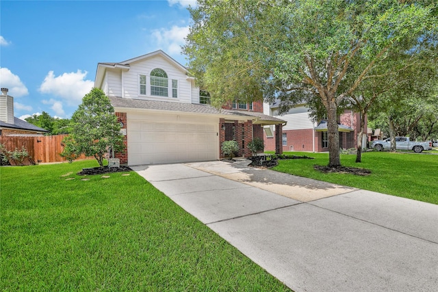 32126 Willow Creek Park, Conroe, TX 77385 - traditional home featuring brick siding, concrete driveway, and an attached garage