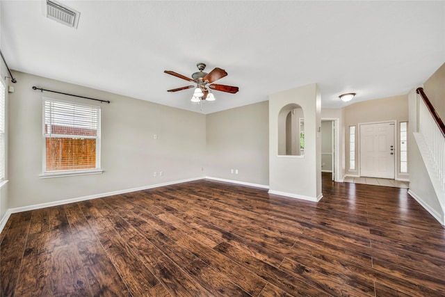32126 Willow Creek Park, Conroe, TX 77385 - unfurnished room featuring a ceiling fan and dark wood-type flooring